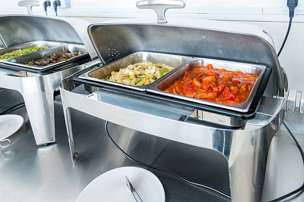 Many buffet heated trays ready for service.