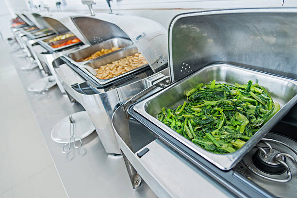 Many buffet heated trays ready for service.